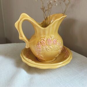 Vintage sweet yellow pitcher with pink tulips and saucer